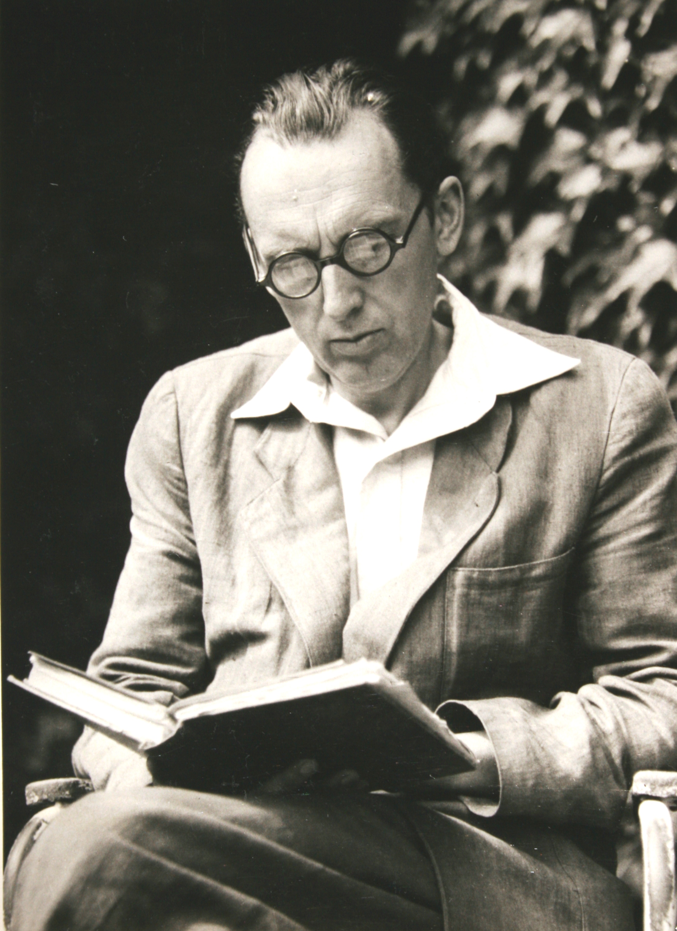 István Bibó reading in the garden, Leányfalu, before 1956