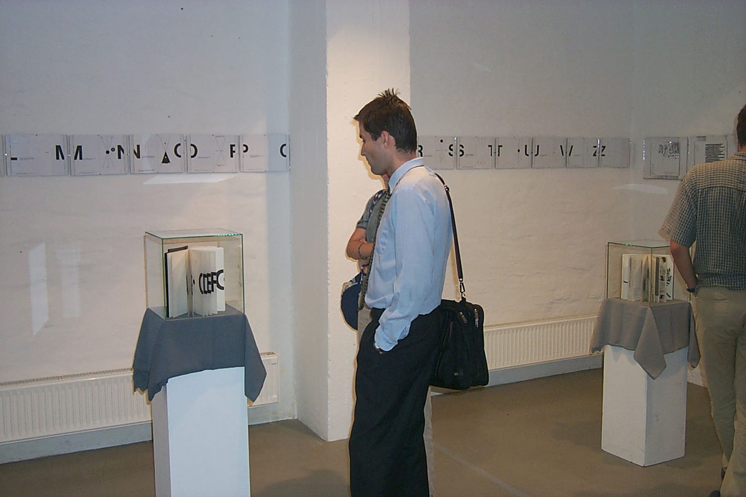 View of the exhibition  THE BOOK (±)SYMMETRY-VIOLATION, Artpool P60, Budapest, 2002 (Curator: györgy Galántai)
