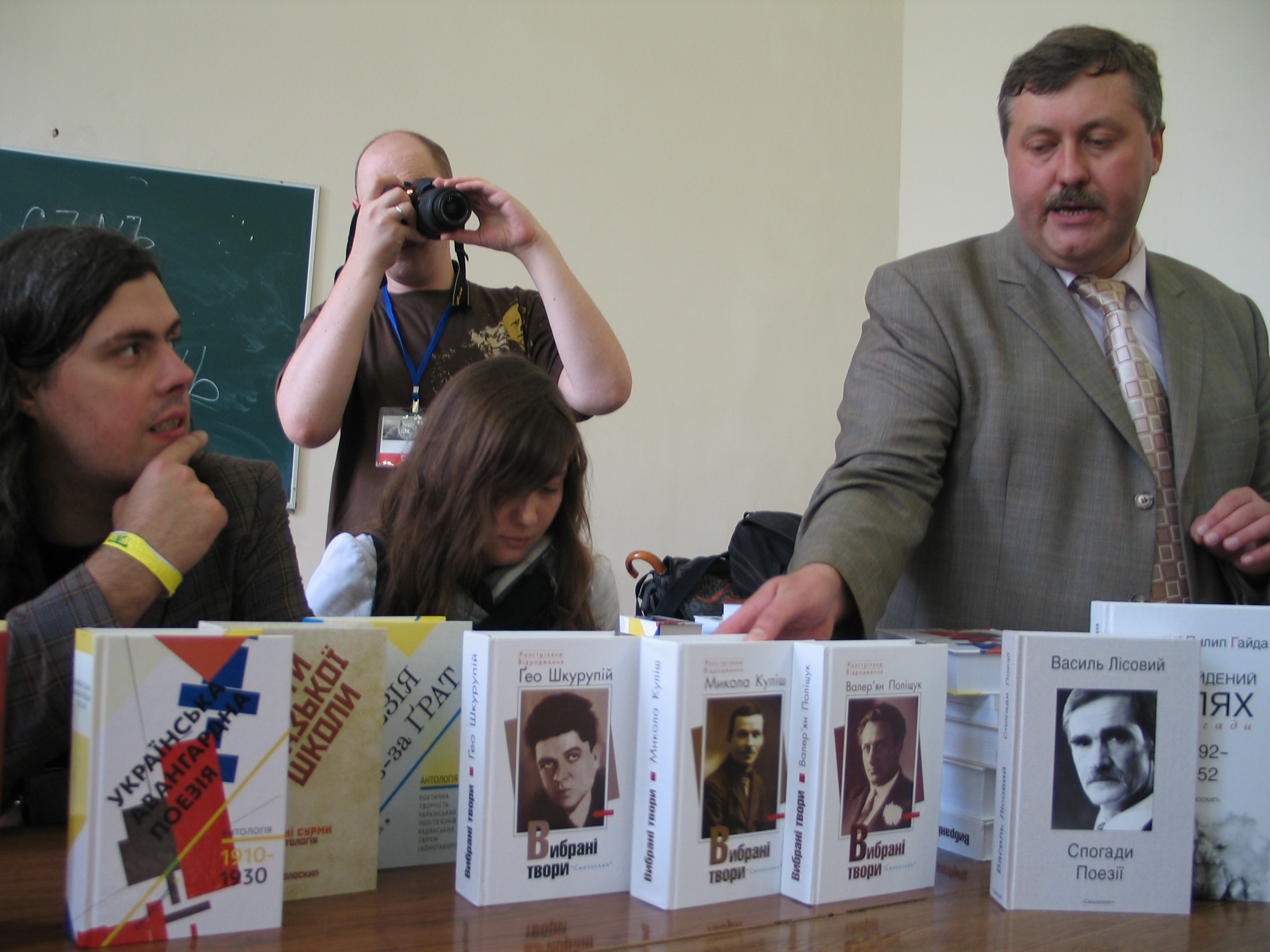 Smoloskyp Publishing House presentation at Lviv University during Publishers' Forum. Rostyslav Semkiv, the director, is speaking. Next to him (from right to left) are Yulia Stakhivska and Oleh Kotsarev, the poets and compilers of the anthology of Ukrainian avantgarde poetry