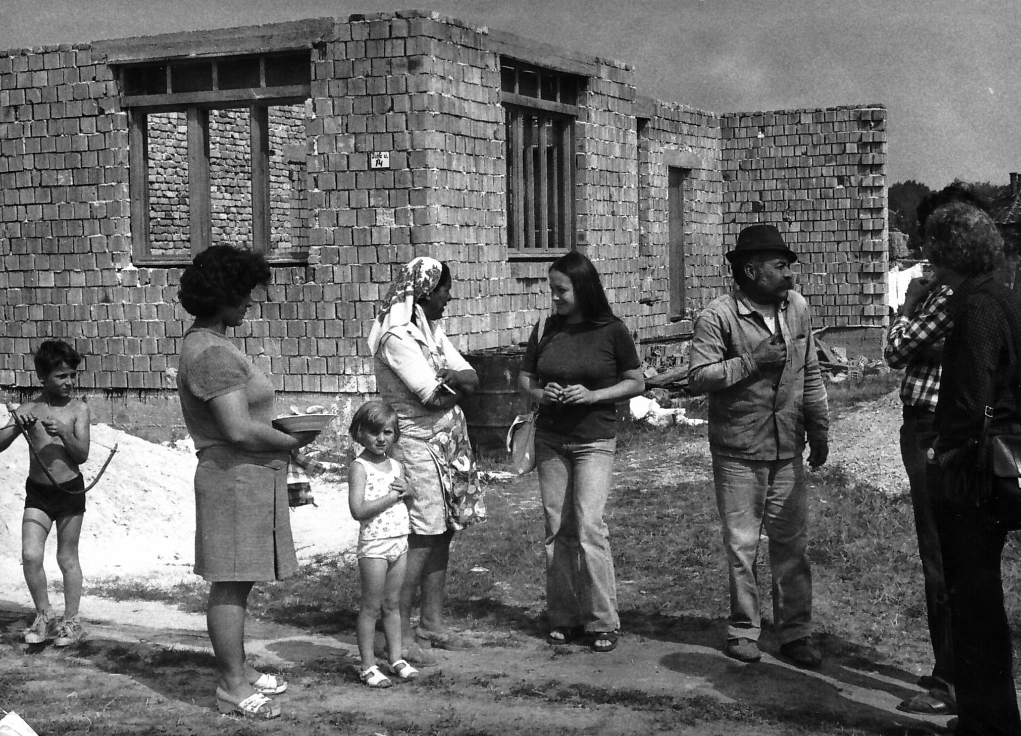 Sociologist Gabiella Lengyel as an activisit visiting countryside Roma families building their new homes by the support of SZETA in the village of Nógrádmegyer,Hungary 1981. 