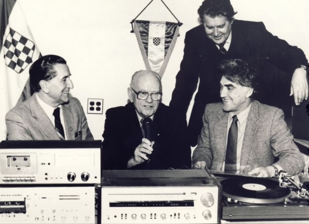 The picture shows the editorial staff of The Voice of Free Croatia sponsored by the Croatian Radio Club in New York, founded in 1969 and still on the air. From left Vinko Kužina, John (Ivan) Pintar (1904-1989), Kurnoslav Mašina (1904-1989) and behind them is Miro Gal.