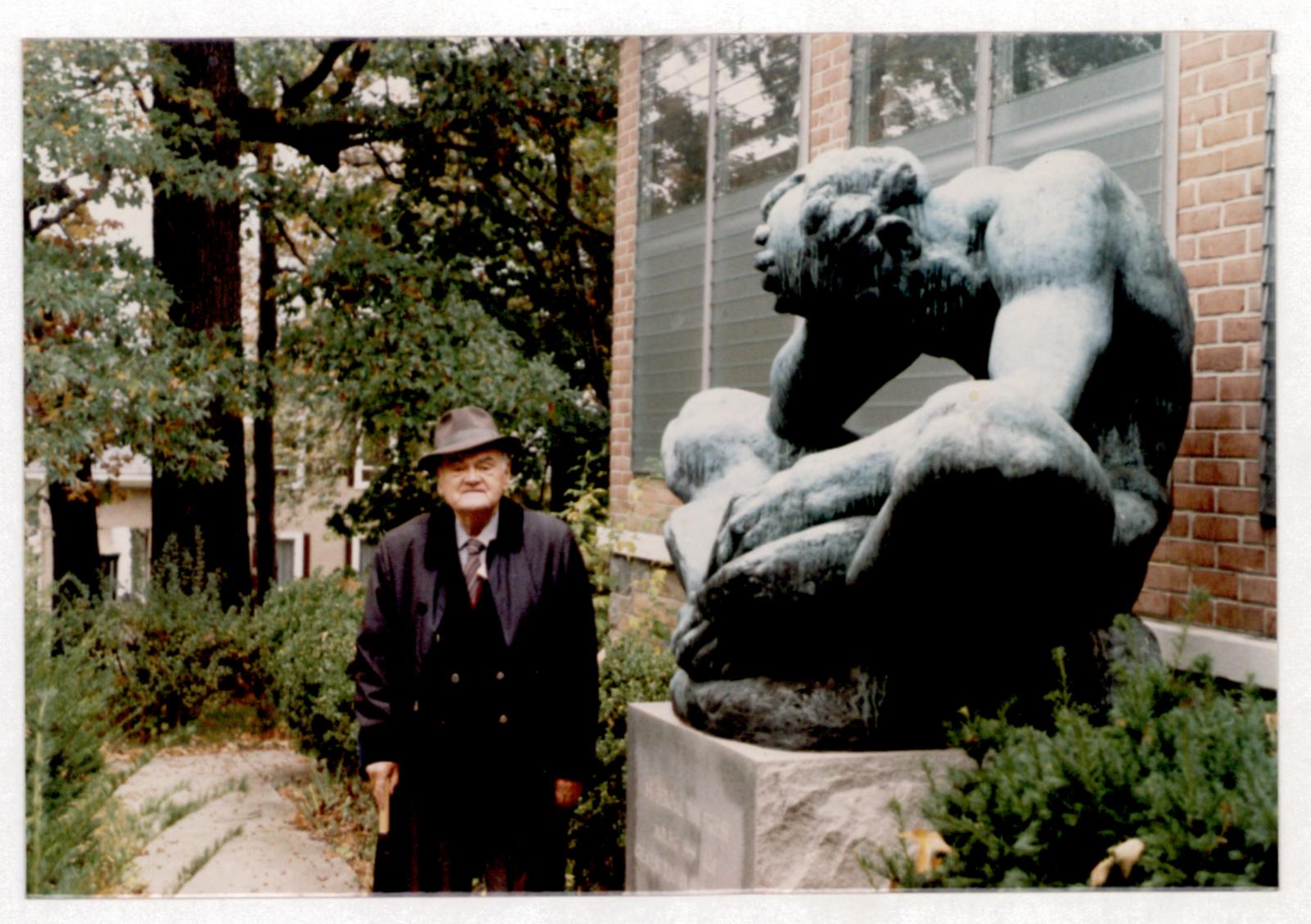 Bogdan Radica in front of the statue of Saint Jerome of Dalmatia in the 1980's in the garden of a Franciscan Monastery in Washington. The statue was made by Ivan Mestrović, also a Croatian emigrant. Photo source: HR-HDA-1769, Bogdan Radica Personal Archive Fund, box 36.