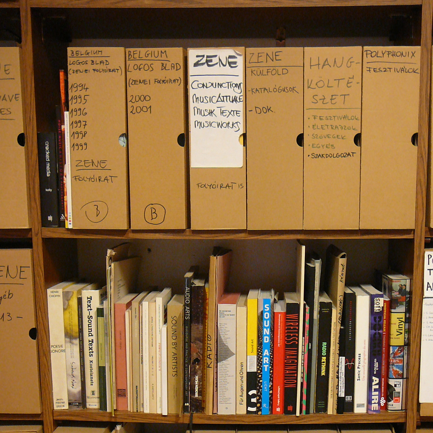 A bookshelf with general literature about sound poetry at Artpool Art Research Center.